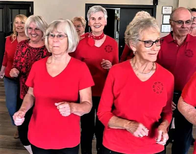 senior citizens in line dancing class at summerfield retirement community Tigard, OR