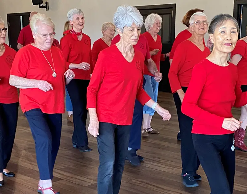 senior citizens in line dancing class at summerfield retirement community Tigard, OR