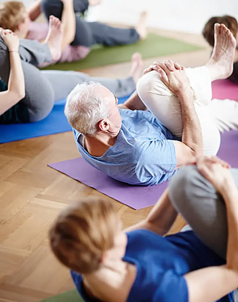 residents doing yoga at summerfield retirement community