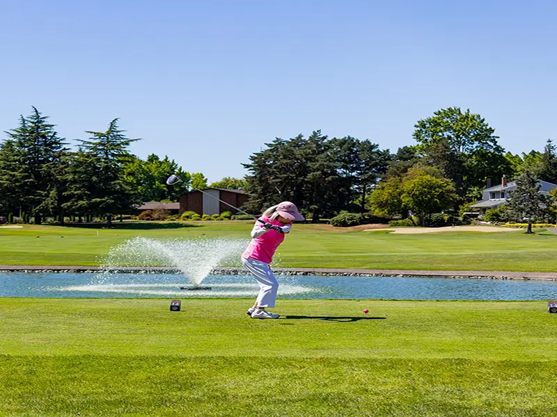Lady Golfing at Summerfield Retirement Community